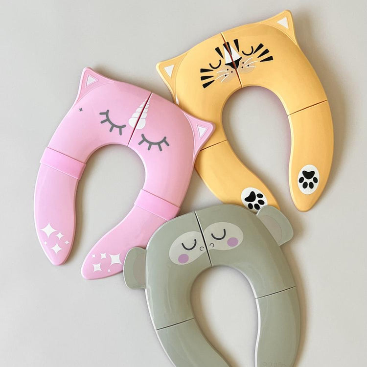 Foldable potty training seat for toddlers with silicone joint covers to prevent pinching